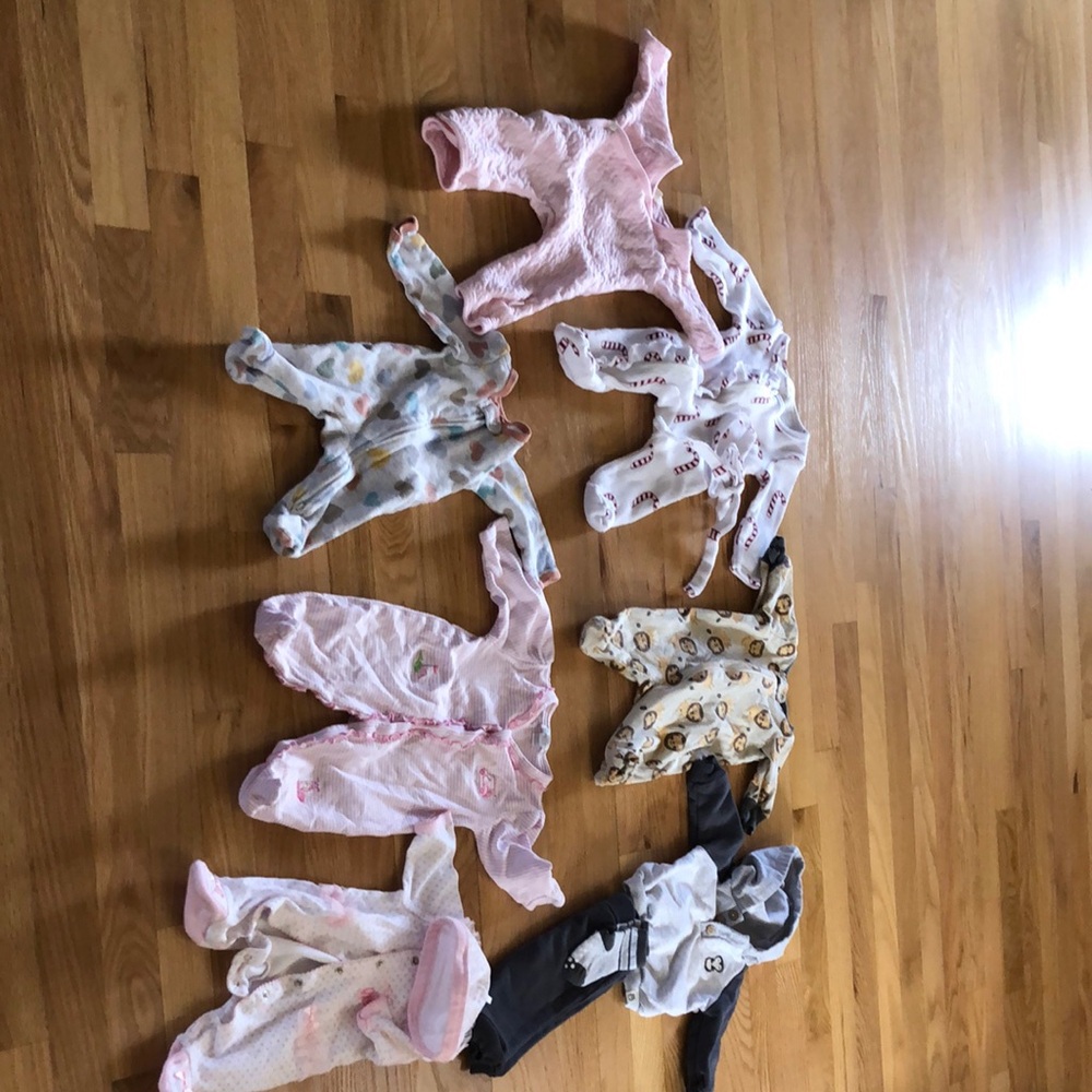 Lot of 7 baby clothes, 2 preemie, 2 newborn, 3 0-3 pieces.